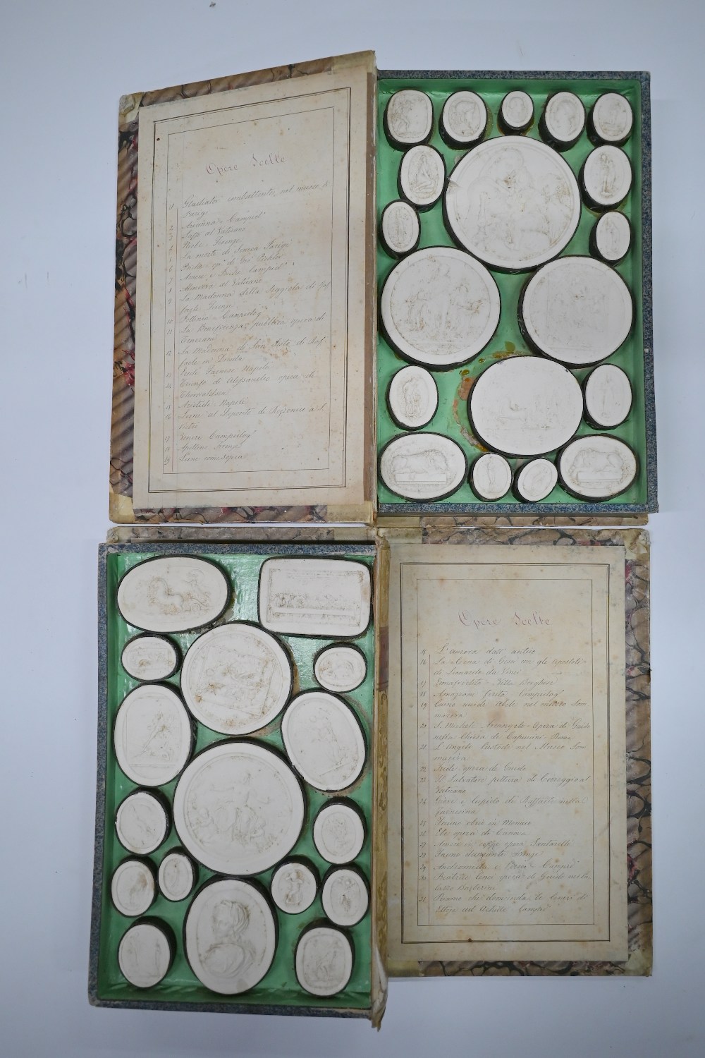 Two early 19th century Grand Tour sets of cast plaster classical relief plaques, in book-form - Image 2 of 6