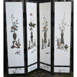 An early 20th century Chinese four-panel folding dress screen, the front with white lacquered panels