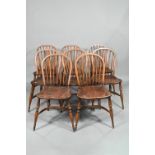A set of eight late 19th century elm and ash spindle back chairs with crinoline stretchers (8)