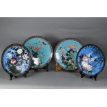 A pair of 19th century Japanese cloisonne chargers, decorated in polychrome enamels with red red-
