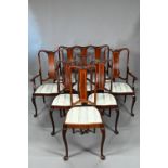 A good Edwardian Sheraton Revival boxwood inlaid red walnut seven piece salon suite, comprising a