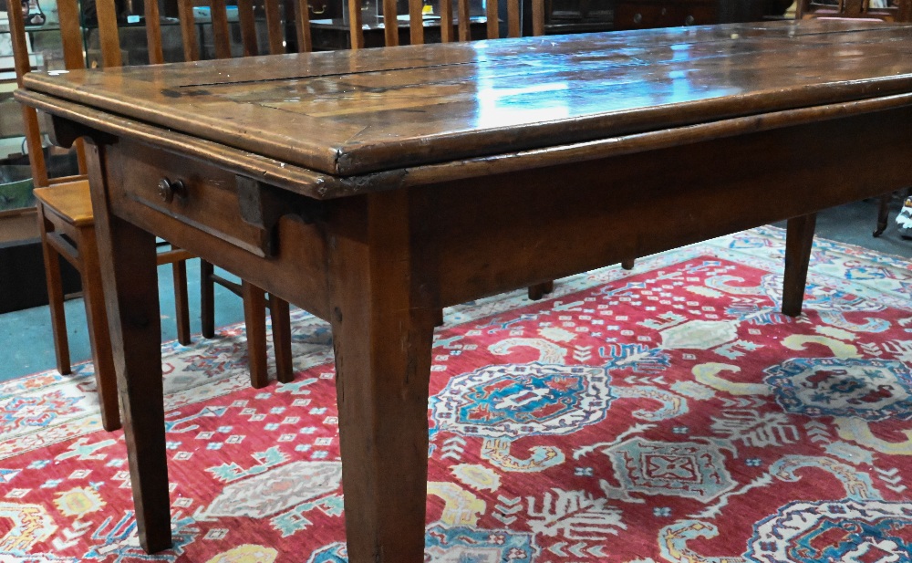 An antique French fruitwood extending draw leaf dining table, with frieze drawer to one end, - Image 4 of 15