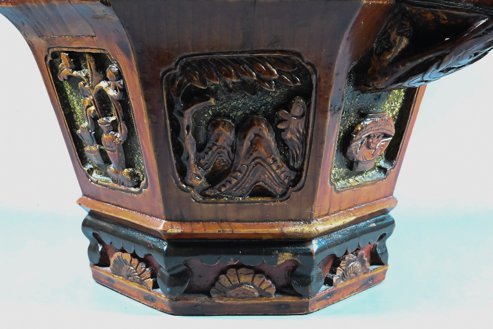 A Chinese stained hardwood water bucket of tapering octagonal form with floral and foliate fret- - Image 5 of 10