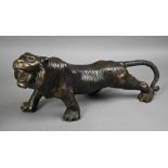 A large 20th century bronze figure of a fierce prowling tiger in the Japanese manner, unsigned, 45