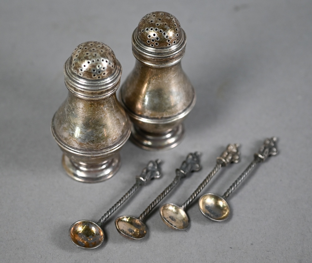 Set of four Victorian silver salt spoons with gilt bowls, on twist stems with Apostle finials,