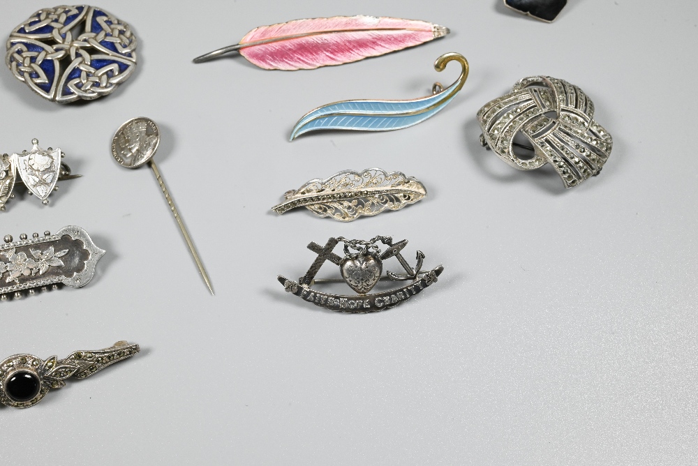 A collection of Victorian and later silver and white metal brooches, pendants and pins including - Image 6 of 6