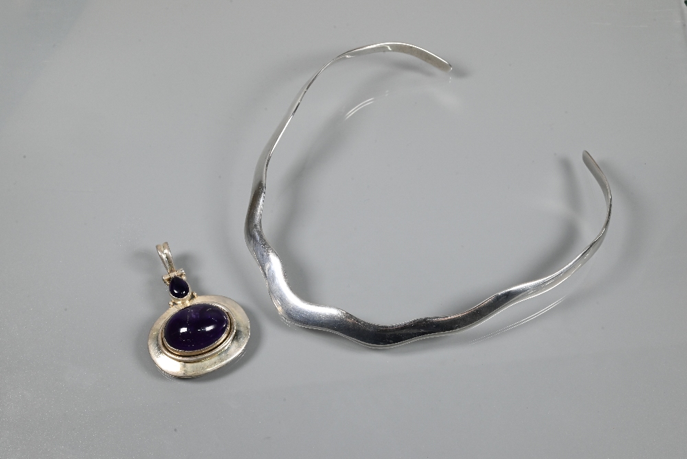 A contemporary white metal torque of wavy form, stamped 925 to/w a white metal pendant set two - Image 2 of 7