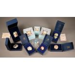 Nine various boxed Halcyon Days enamel boxes