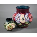 A Moorcroft 'Pansy' globular vase with flared neck, signed R Bishop, J Moorcroft & W M monogram,