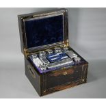 Victorian brass-inlaid coromandel dressing case, the cut glass fittings with silver tops, Thomas