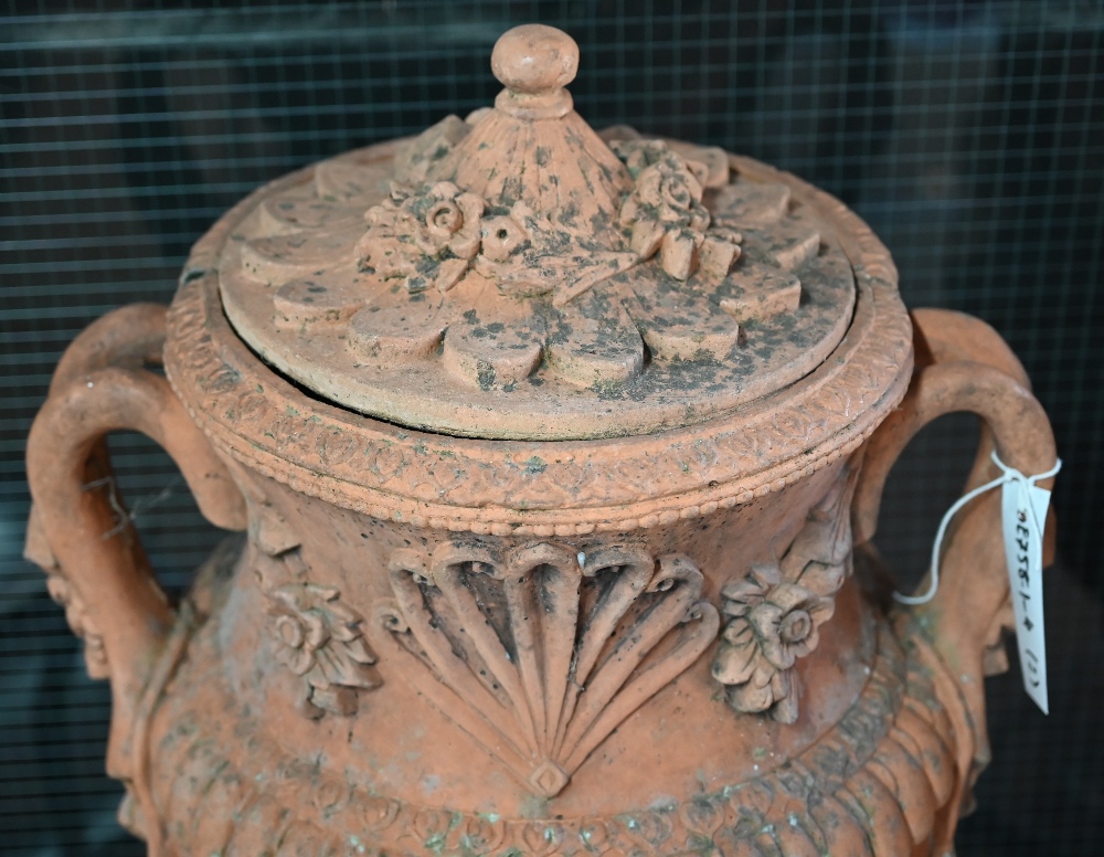 A large pair of weathered classical cast terracotta lidded urns, with twin loop handles and - Image 3 of 4