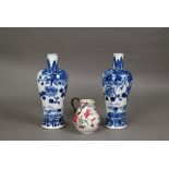 A pair of late 19th century Chinese blue and white baluster vases, late Qing dynasty, painted with