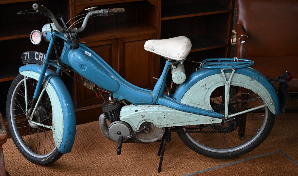 A classic Mobylette 50cc moped, registered April 1960, with registration plate 71 CRH (non
