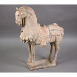 A 20th century Chinese Tang style terracotta horse standing four-square on thin rectangular base,