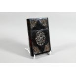 A 19th century Chinese Canton tortoiseshell card-case carved with floral designs around the