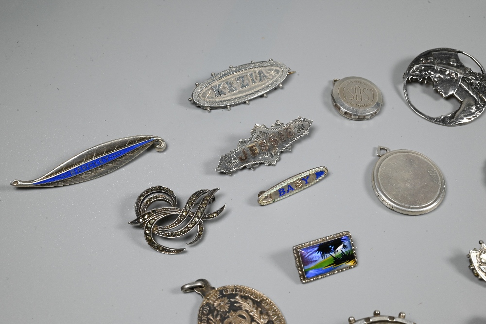 A collection of Victorian and later silver and white metal brooches, pendants and pins including - Image 4 of 6