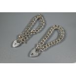 Two modern silver curb bracelets, each fitted with safety chain and padlock, approx 70.3g (2)