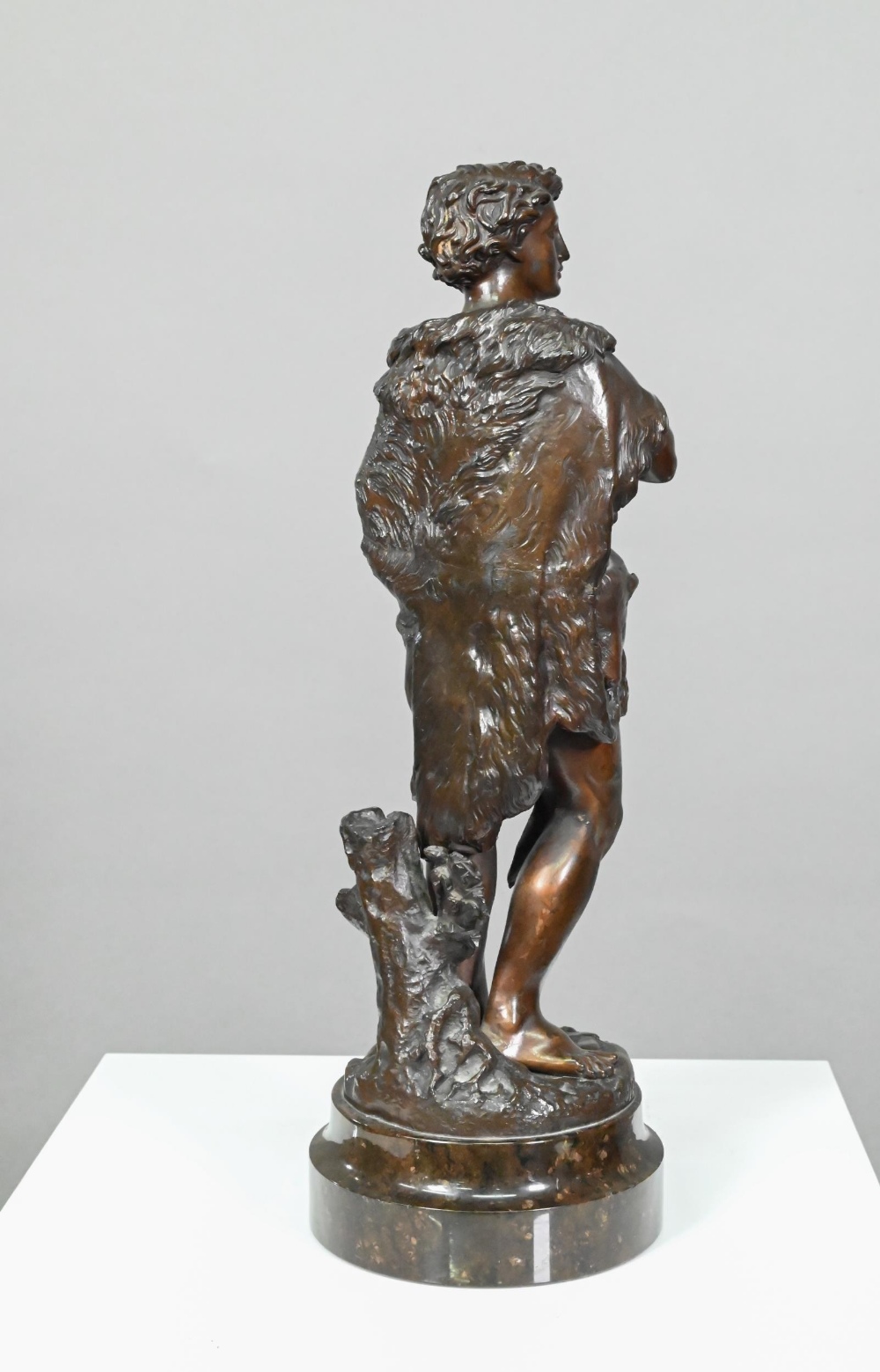 Emile Boyer (1877 - 1948), a brown-patinated bronze sculpture of a huntsman in wolf-skin cloak, - Image 6 of 6