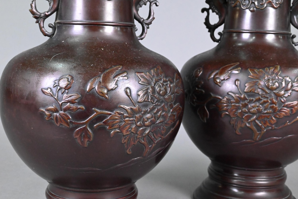 A pair of late 19th or early 20th century Japanese bronze vases, the flaring necks with archaistic - Image 5 of 7