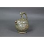A Chinese Yaozhou celadon cadogan teapot or wine pot in the Northern Sony dynasty style, with