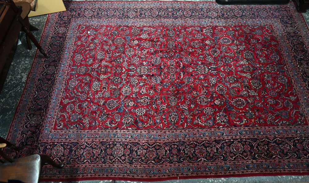 A fine old Persian hand-made Kashan carpet, the red ground with repeating linked garden vine design, - Image 2 of 12