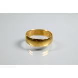 A 22ct yellow gold wedding band, size P 1/2, approx 4.4g