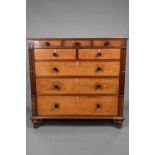 A Victorian country house oak and mahogany chest of three short over two short and three long