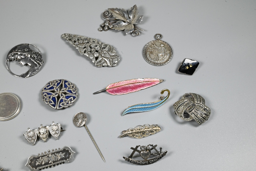 A collection of Victorian and later silver and white metal brooches, pendants and pins including - Image 2 of 6