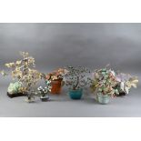 Seven various Chinese soapstone and coloured hard stone jewel tree arrangements, mid 20th century,