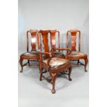 A set of ten Queen Anne style dining chairs, with antiqued brown leather seat pads, raised on