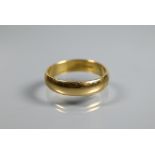 An 18ct yellow gold wedding band, size V, approx 6.3g