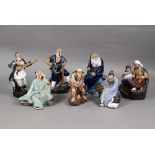 Four 20th century Chinese Shiwan lead-glazed mudmen figures, signed 'Wan Jiang' and three other