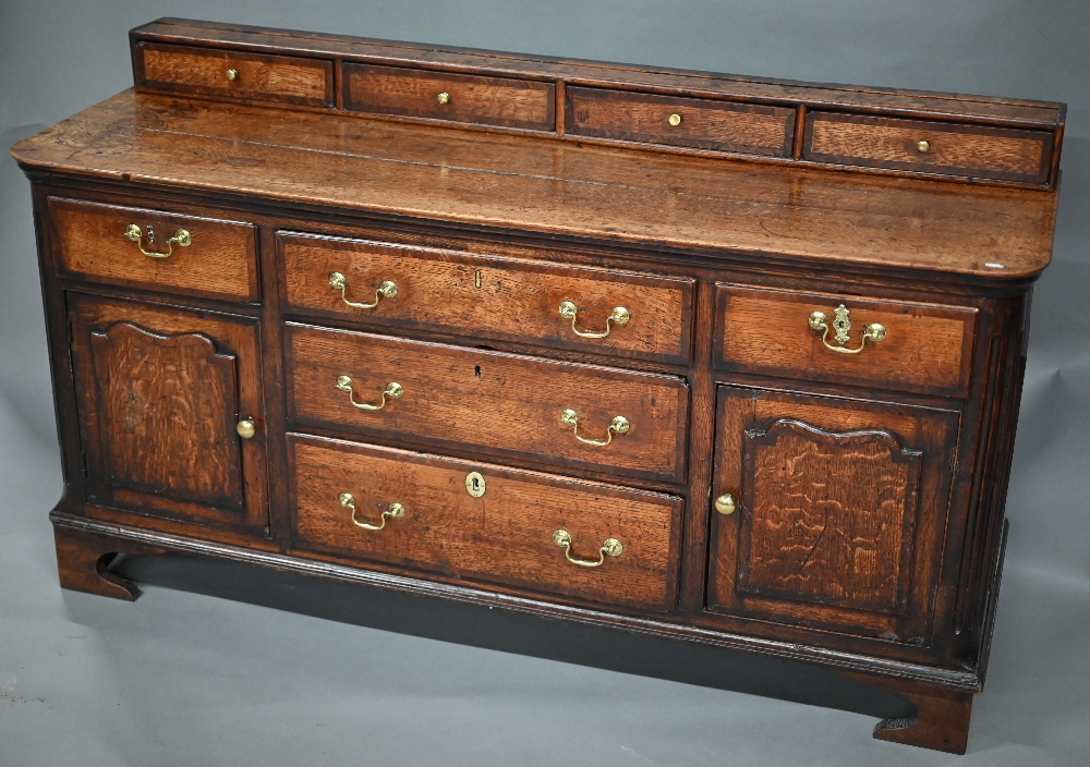 A 18th century oak low dresser, the two plank top with four drawer stage back, over an arrangement - Image 2 of 4