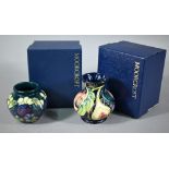 Two small Moorcroft vases - Queen's Choice, designed by Emma Bossons, 9.5 cm high and birds among
