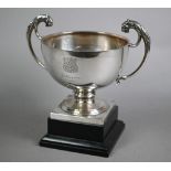 Silver trophy cup with twin leopards' head scrolling handles and engraved with the City of