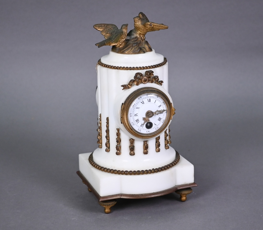 A late 19th century French gilt metal mounted white alabaster mantel clock, the 8-day single drum