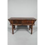 An antique Chinese stained elm two drawer hall table, raised on square legs, 129 cm x 47 cm x 79