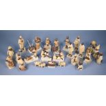 An African carved and stained wood set of Nativity scene figures - the largest 11 cm