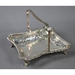 Edwardian pierced silver basket with pierced sides and swing handle, on paw feet, Charles Harris,