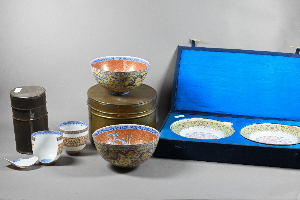 Two 20th century Chinese egg-shell porcelain bowls painted interiors with phoenix and feather-scroll