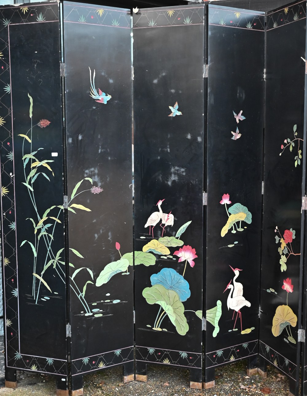 A substantial early 20th century Chinese eight-panel folding screen