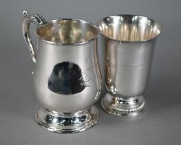 Old Sheffield plate baluster pint mug with leaf-mounted scroll handle, on moulkded foot, engraved