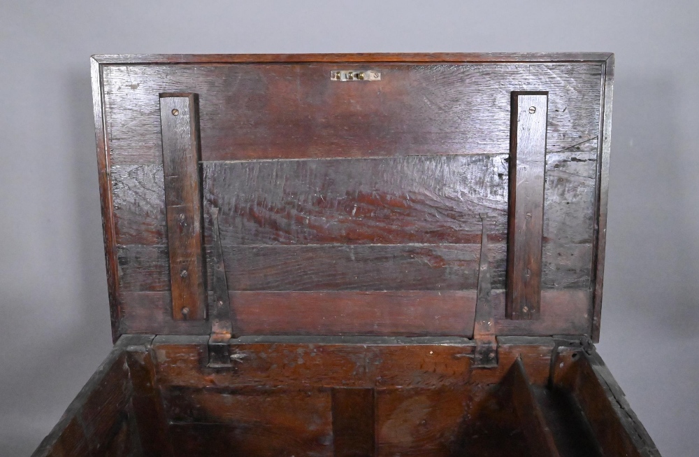 An early 18th and later oak coffer, with lunette carved frieze over a trio of incised panels, on - Image 5 of 8