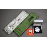 Boxed fine silver (.999 grade) spoon and chopsticks set (unused) to/w a 2005 Korean 20000 WON silver