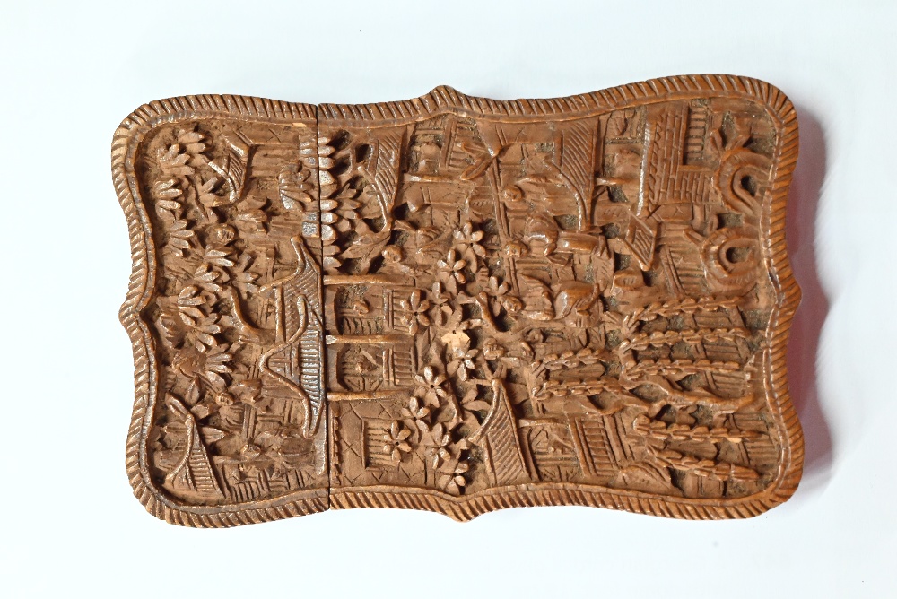 A 19th century Chinese Canton sandalwood card case profusely carved with a village scene, - Image 8 of 10