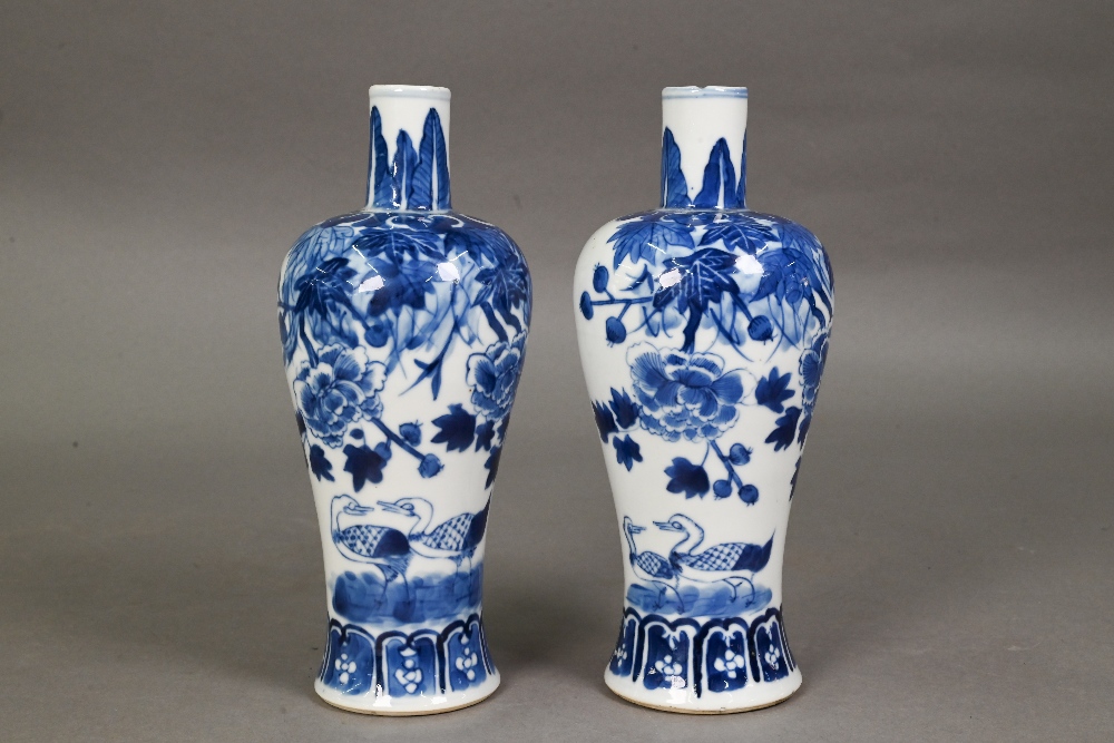 A pair of late 19th century Chinese blue and white baluster vases, late Qing dynasty, painted with - Image 10 of 17