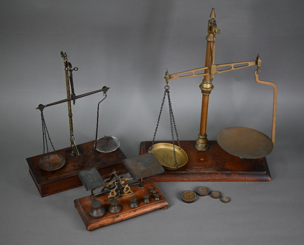 A 19th century set of brass and steel scales on mahogany base with drawer, 37 cm high to/w a large