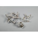 Just Andersen - A Danish silver brooch formed of two conjoined stylised triangles, number 717,