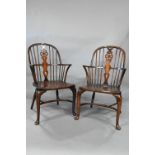 A pair of oak/elm hoop and wheelback Windsor armchairs, with crinoline stretchers (2)