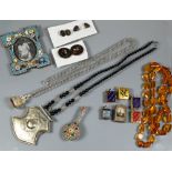 A small collection of jewellery and other items including amber necklace, Middle Eastern necklace,